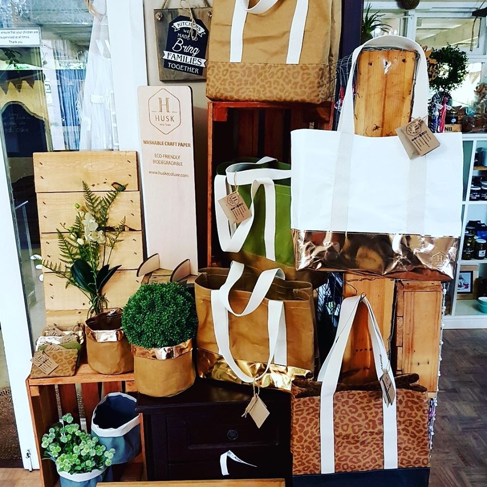 Displaying the trendy collection of shoppers and planters at a local boutique store